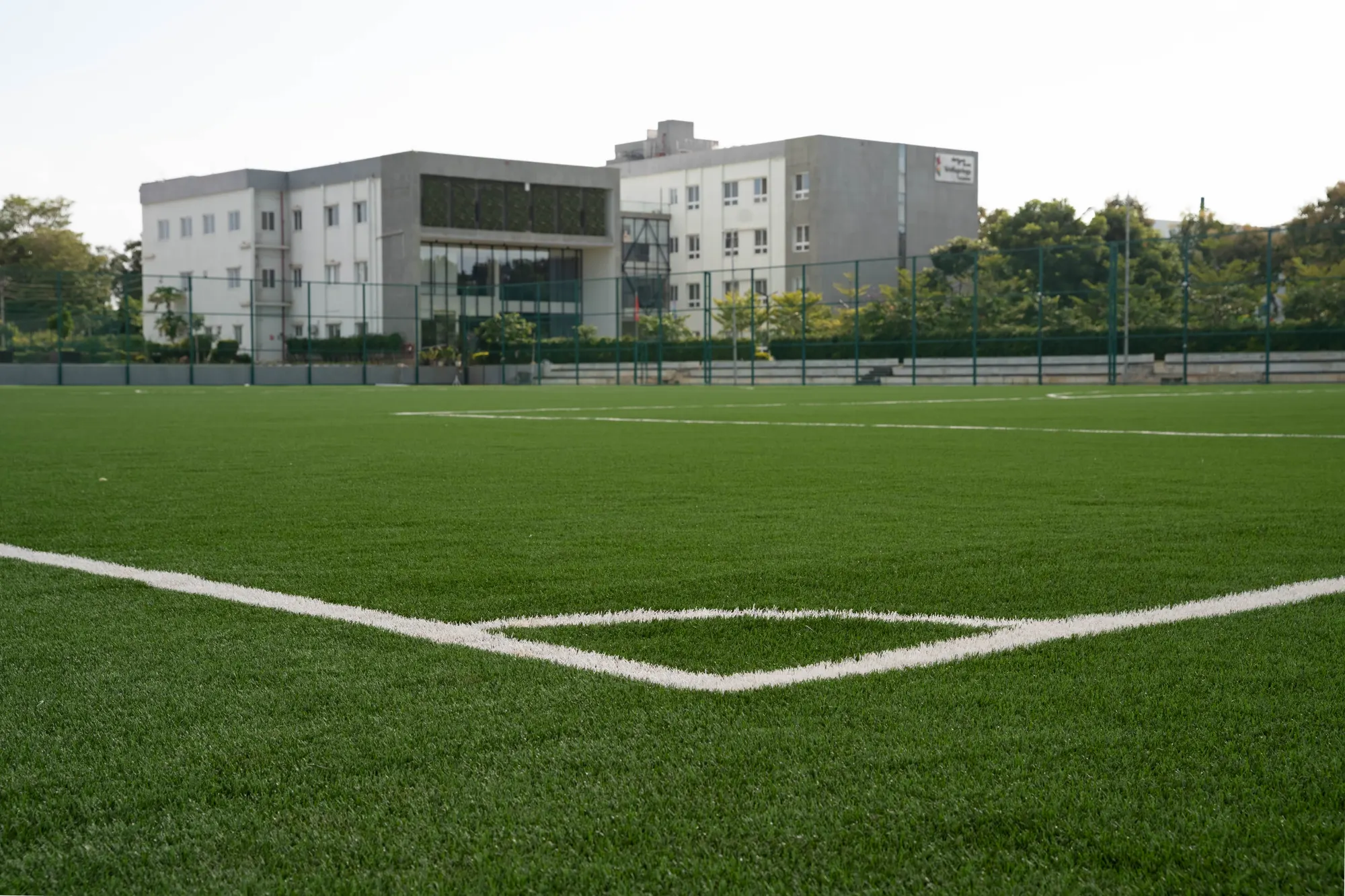 The playing field in front of the school building